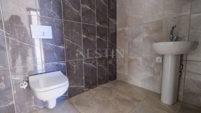 Новые апартаменты 2+1 в популярном районе Махмутлар, в 450 метрах от моря фото 10