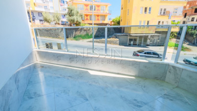 Новые апартаменты 2+1 в популярном районе Махмутлар, в 450 метрах от моря фото 13