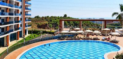 Меблированная квартира 1+1 в неотразимом комплексе с инфраструктурой отеля в районе Махмутлар, в 1700 метрах от Средиземного моря фото 1