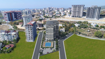 Квартиры 1+1 и 2+1 в комплексе на этапе стротиельства в районе Авсаллар фото 20