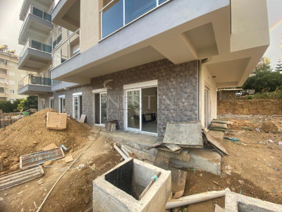 Квартира 2+1 в районе Джикджилли, в новом доме, в 2 км от Средиземного моря фото 2