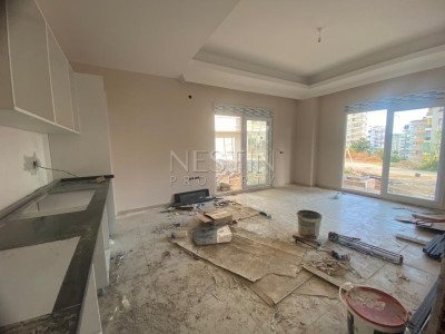 Квартира 2+1 в районе Джикджилли, в новом доме, в 2 км от Средиземного моря фото 5