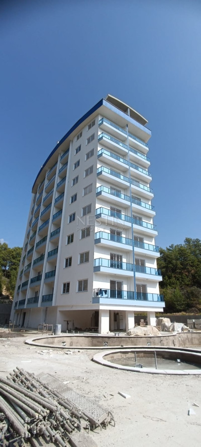 Квартира 1+1 в районе Авсаллар в новом доме, в 2000 м от Средиземного моря фото 5