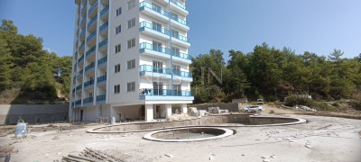 Квартира 1+1 в районе Авсаллар в новом доме, в 2000 м от Средиземного моря фото 7