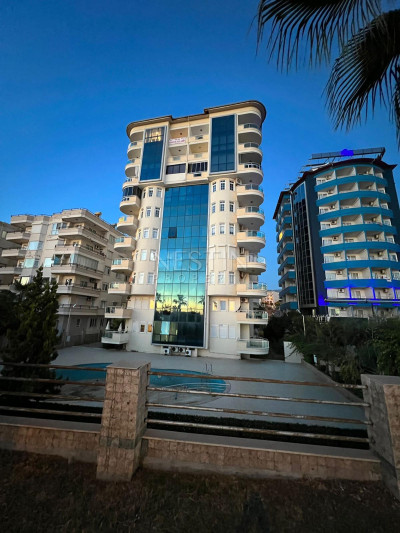 Квартира дуплекс 4+1, в районе Тосмур, в 10 м от Средиземного моря фото 1