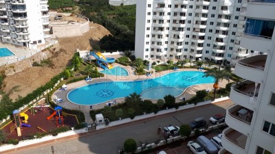 Большая квартира 2+1 в зеленом комплексе в центре Махмутлара фото 5