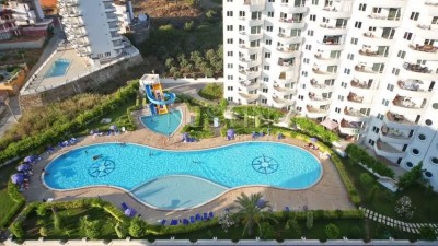 Большая квартира 2+1 в зеленом комплексе в центре Махмутлара фото 7