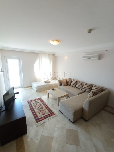 Большая квартира 2+1 в зеленом комплексе в центре Махмутлара фото 17