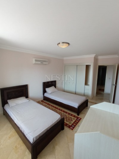 Большая квартира 2+1 в зеленом комплексе в центре Махмутлара фото 23