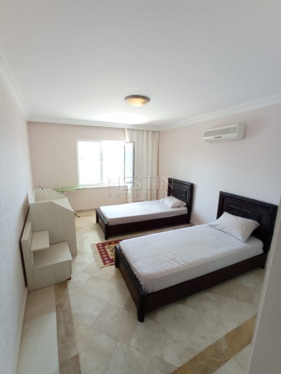 Большая квартира 2+1 в зеленом комплексе в центре Махмутлара фото 24