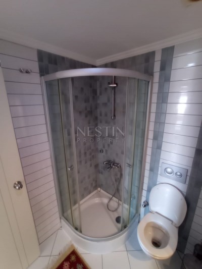 Большая квартира 2+1 в зеленом комплексе в центре Махмутлара фото 31