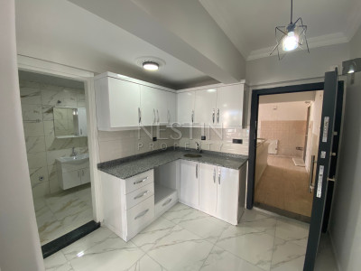 Квартира 2+1 в курортном районе Конаклы в 100 м от Средиземного моря. фото 2