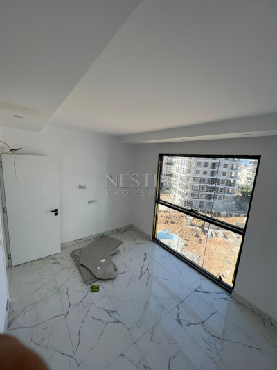 Квартира 1+1 в районе Махмутлар в новом жилом комплексе фото 7