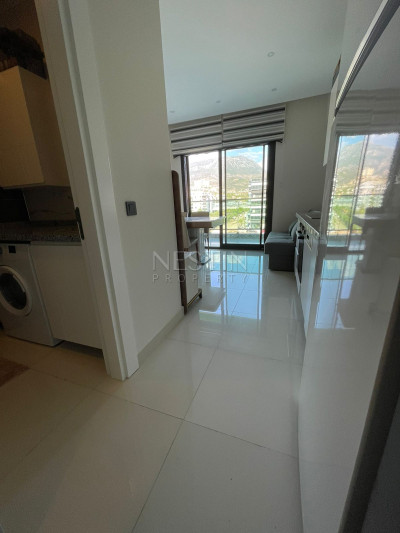 Квартира 1+1 в районе Каргыджак в новом жилом комплексе в 50 м от Средиземного моря фото 2