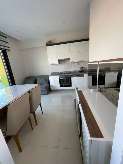 Квартира 1+1 в районе Каргыджак в новом жилом комплексе в 50 м от Средиземного моря фото 3