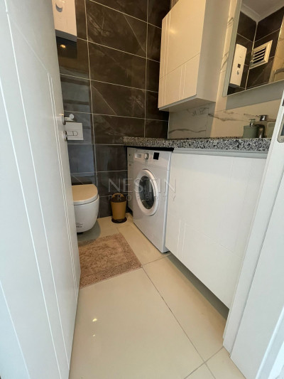 Квартира 1+1 в районе Каргыджак в новом жилом комплексе в 50 м от Средиземного моря фото 13