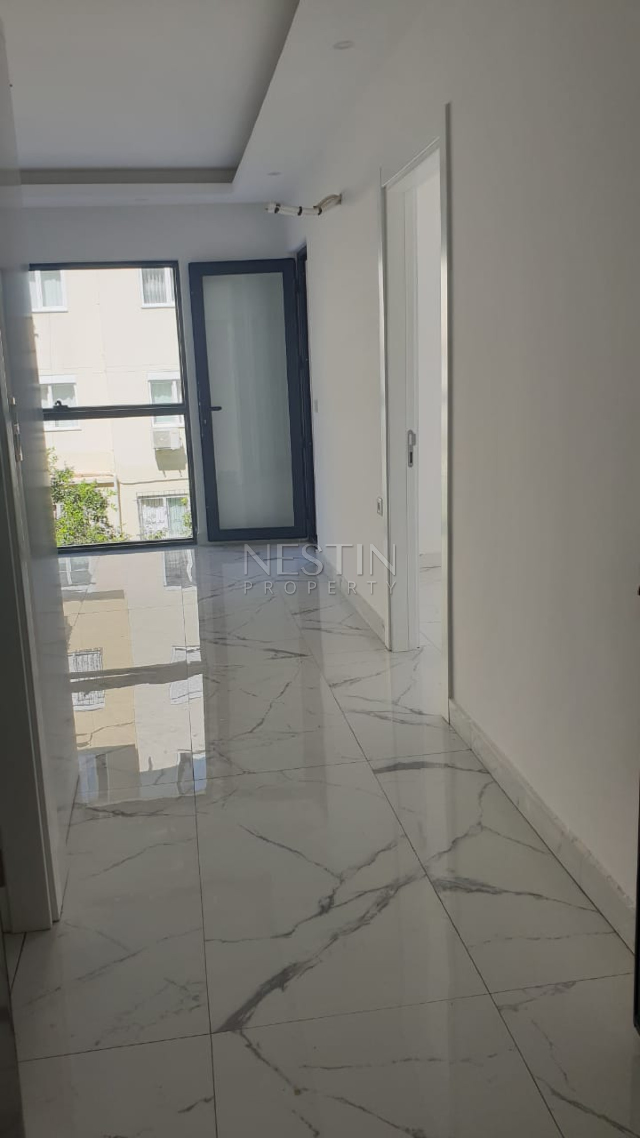 Квартира 1+1 в центре города Аланья в новом доме в 1000 м от Средиземного моря фото 2