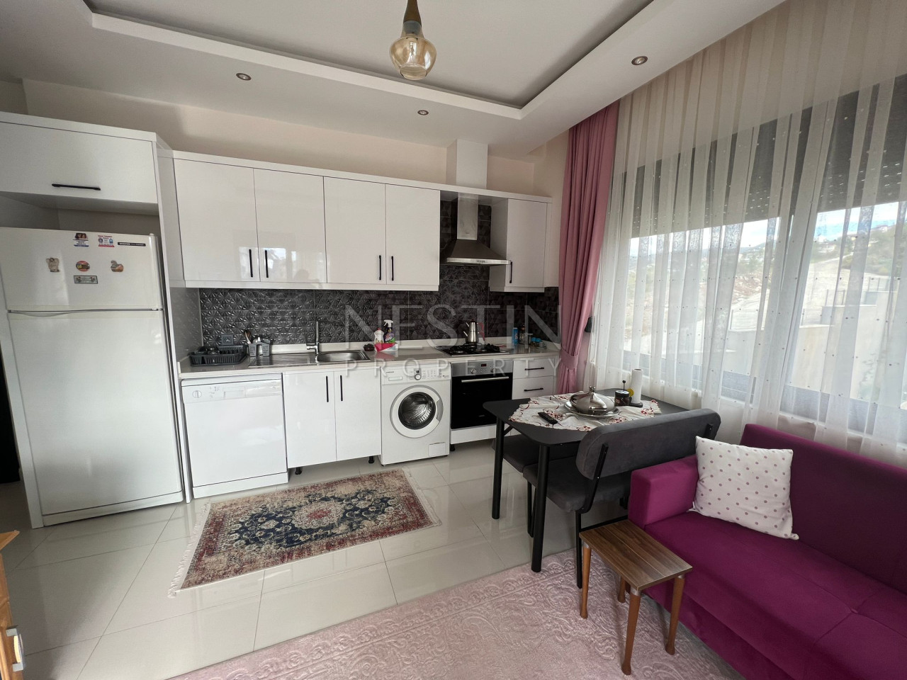 Квартира 1+1 в районе Каргыджак в новом доме в 700 м от Средиземного моря фото 4