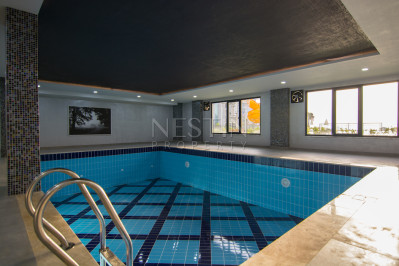 Квартира 1+1 в районе Каргыджак в новом доме в 700 м от Средиземного моря фото 13