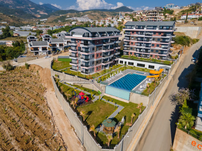 Квартира 1+1 в районе Каргыджак в новом доме в 700 м от Средиземного моря фото 25