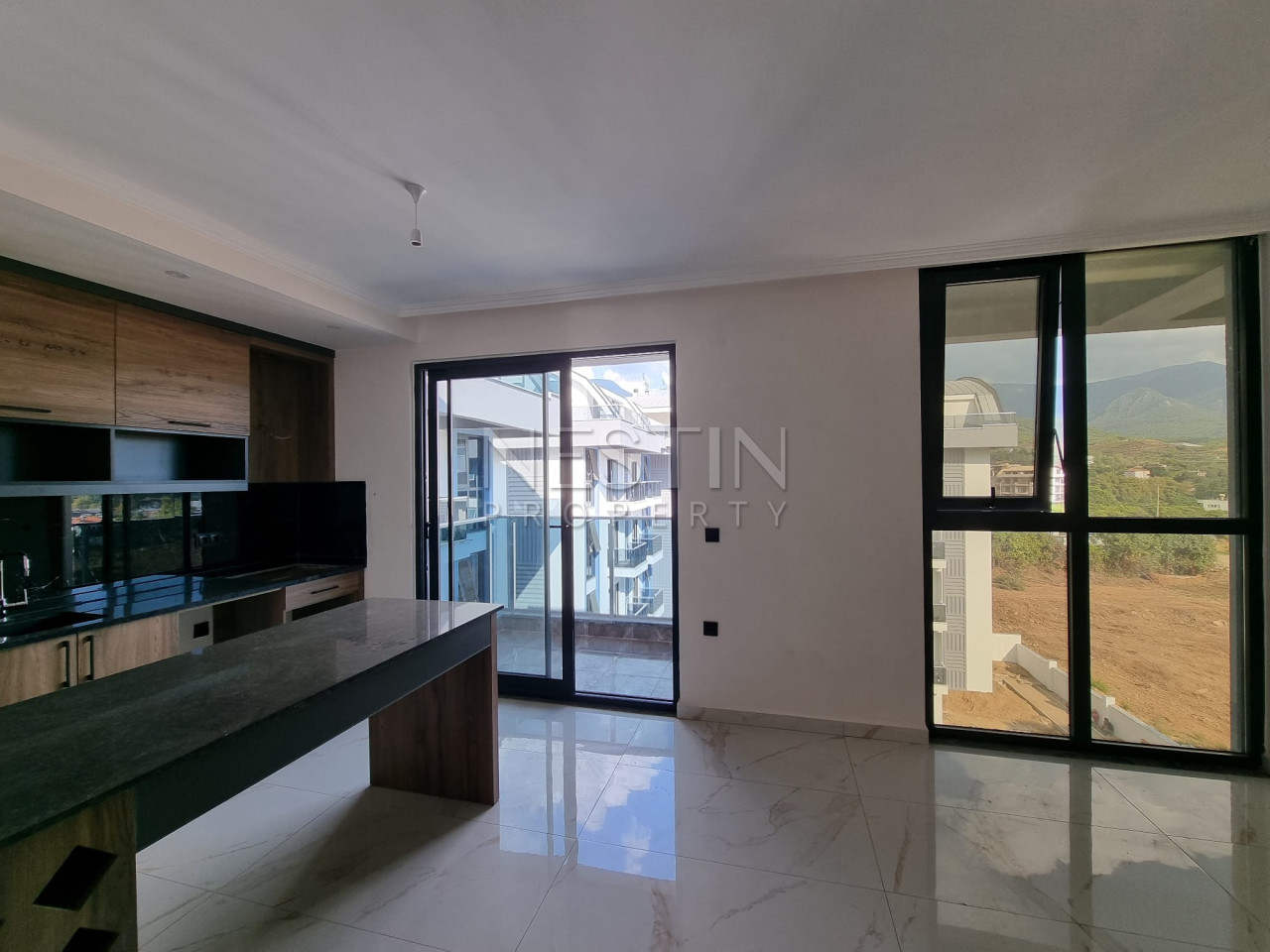 Квартира дуплекс 2+1 в районе верхней Обы в новом доме с видом на горы фото 3