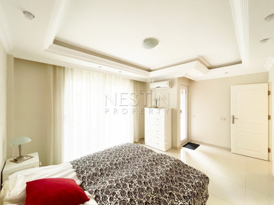 Квартира дуплекс 3+1 в районе Джикджилли с видом на горы фото 17