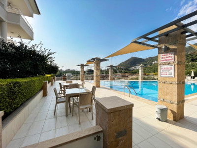 Квартира дуплекс 3+1 в районе Джикджилли с видом на горы фото 37