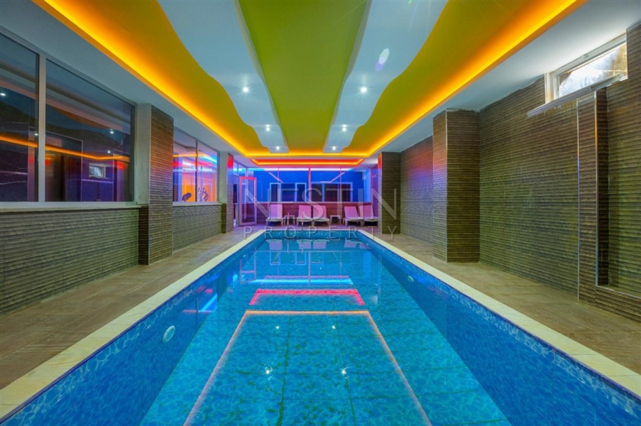 Меблированная квартира 1+1 в новом доме в Махмутларе в 300 метрах от моря фото 7