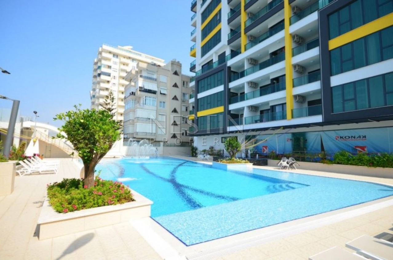 Апартаменты 2+1 в элитном жилом комплексе в Махмутларе на первой береговой линии фото 3