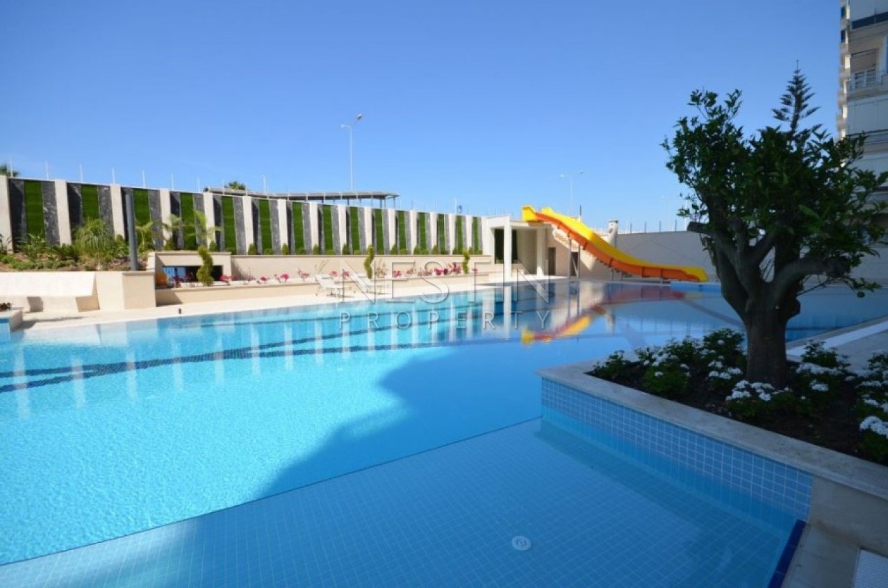 Апартаменты 2+1 в элитном жилом комплексе в Махмутларе на первой береговой линии фото 7