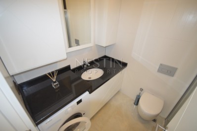 Апартаменты 2+1 в элитном жилом комплексе в Махмутларе на первой береговой линии фото 15