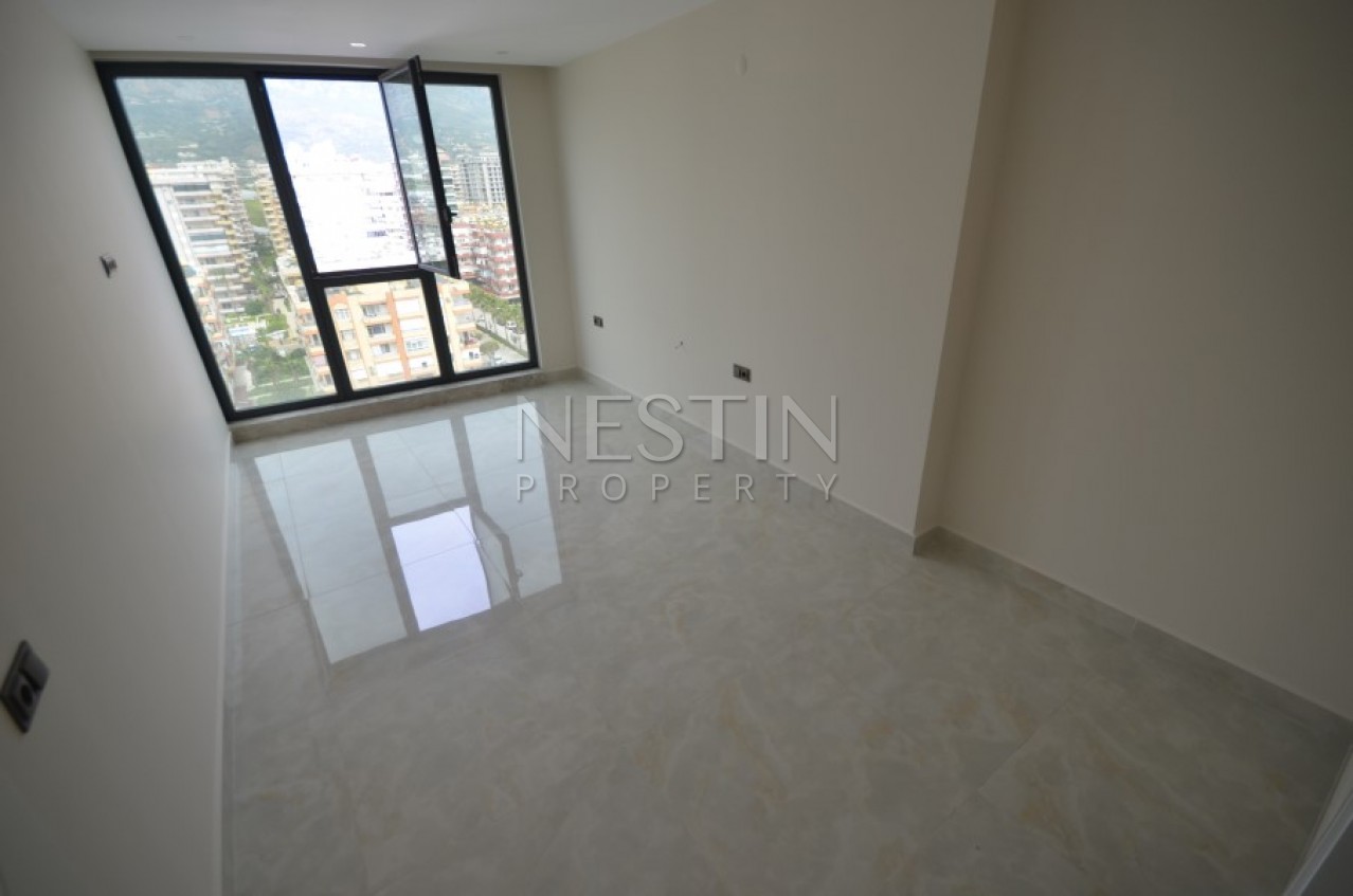 Апартаменты 2+1 в элитном жилом комплексе в Махмутларе на первой береговой линии фото 18