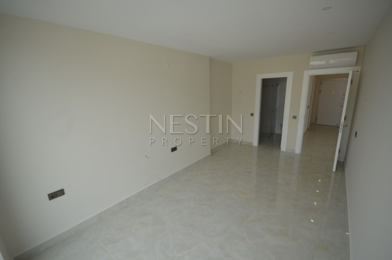 Апартаменты 2+1 в элитном жилом комплексе в Махмутларе на первой береговой линии фото 19