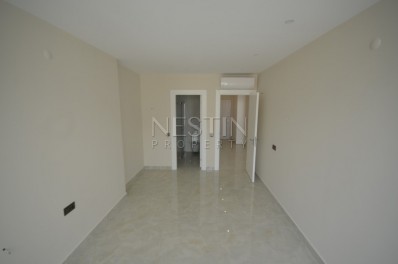 Апартаменты 2+1 в элитном жилом комплексе в Махмутларе на первой береговой линии фото 20