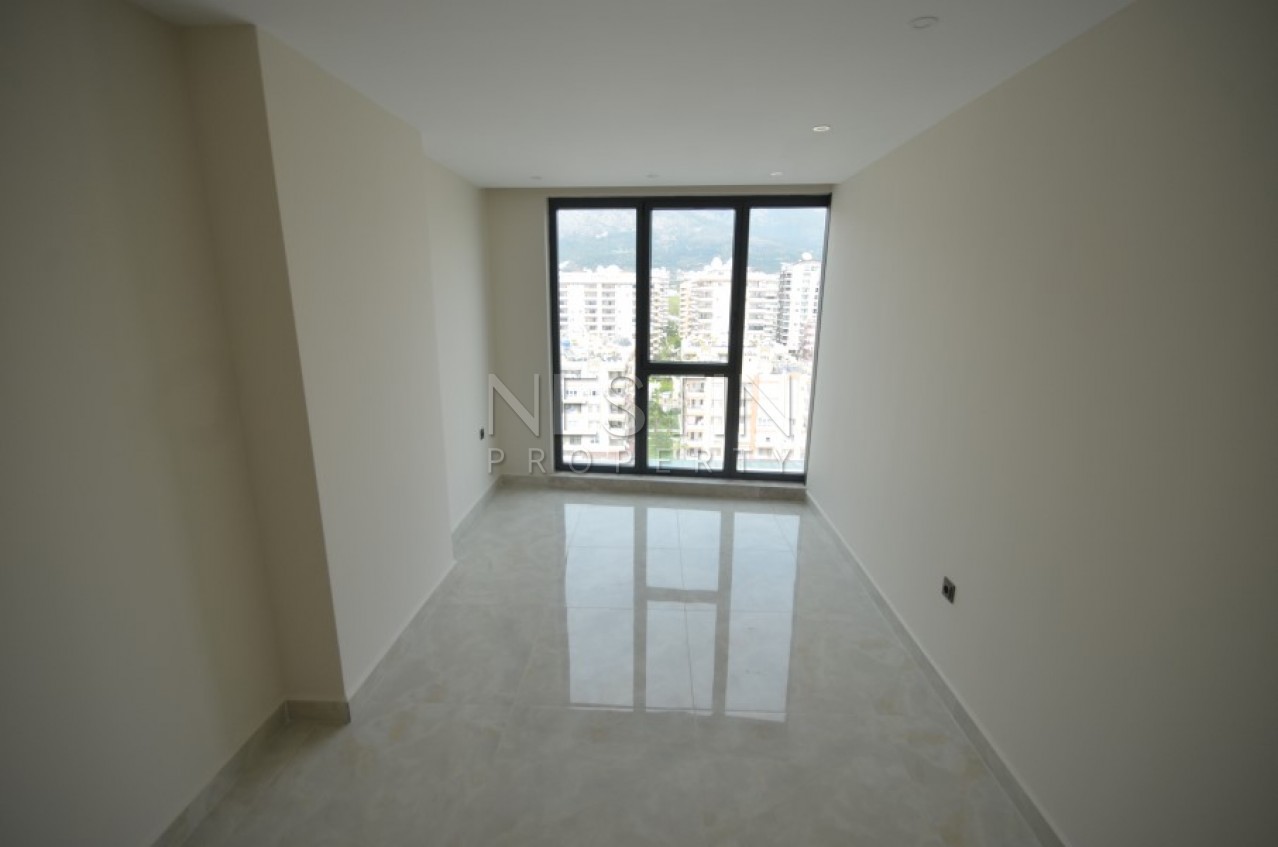 Апартаменты 2+1 в элитном жилом комплексе в Махмутларе на первой береговой линии фото 25