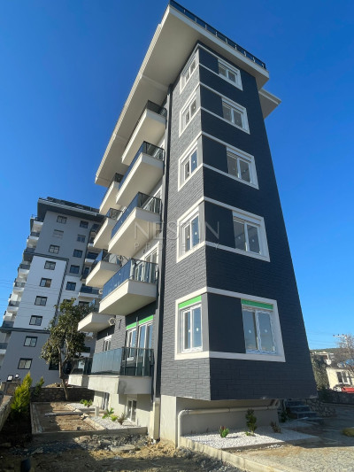 Квартира 1+1 в районе Авсаллар в новом жилом доме в 1500 м от Средиземного моря фото 2