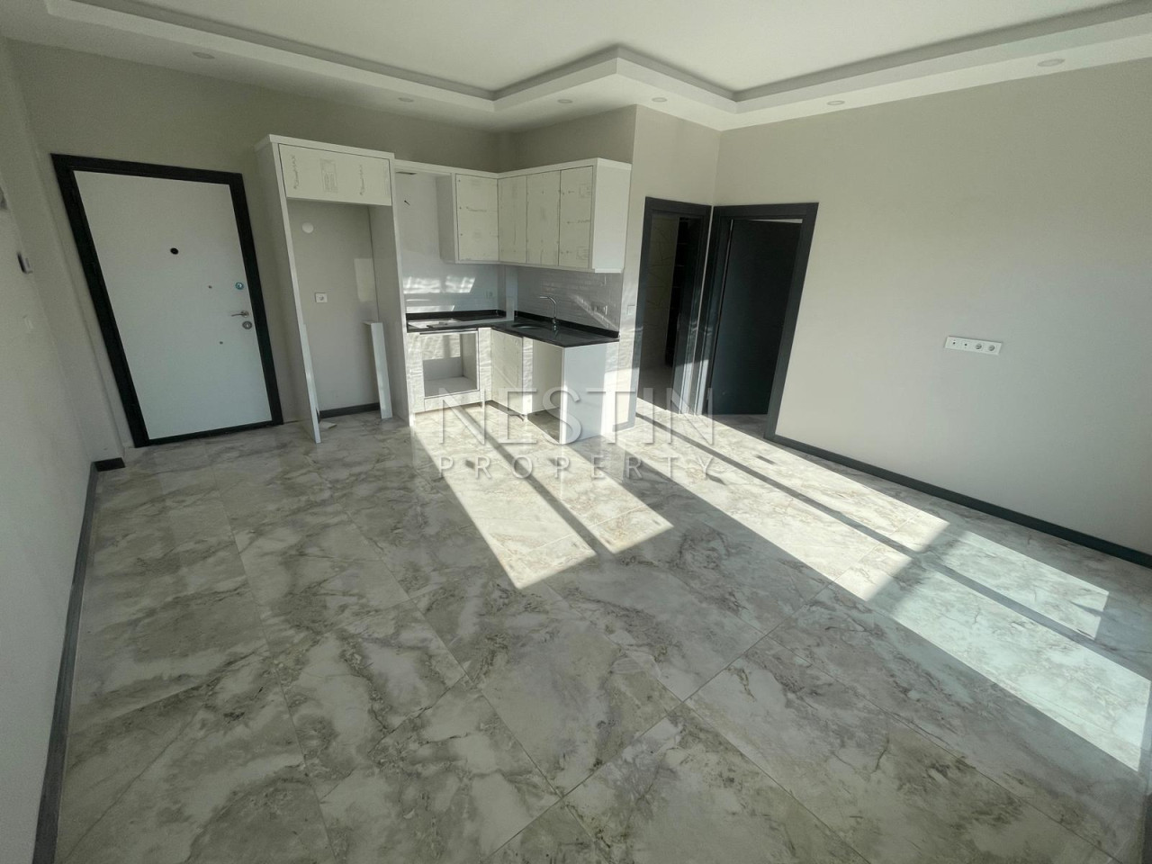 Квартира 1+1 в районе Авсаллар в новом жилом доме в 1500 м от Средиземного моря фото 4