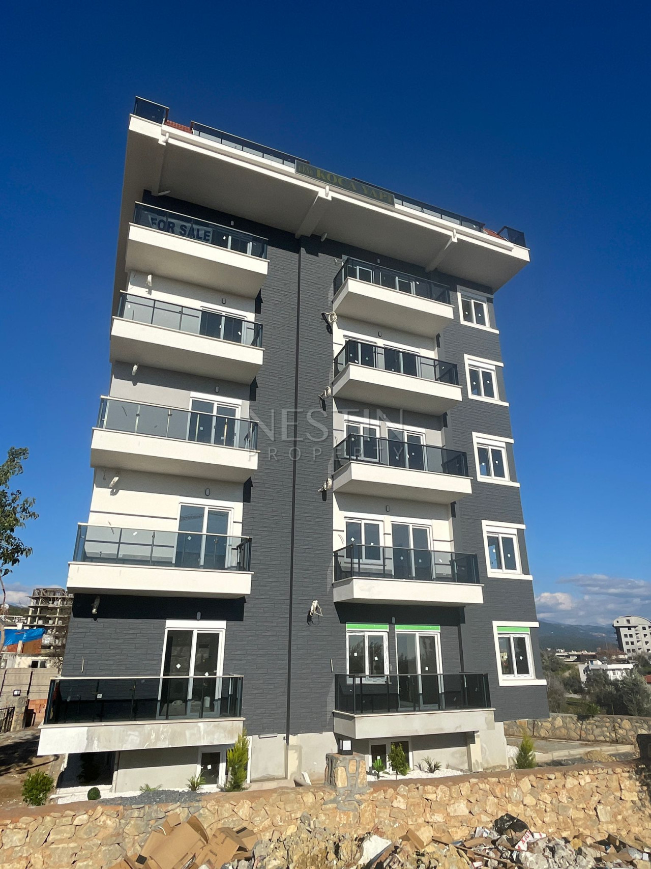 Квартира 1+1 в районе Авсаллар в новом жилом доме в 1500 м от Средиземного моря фото 1