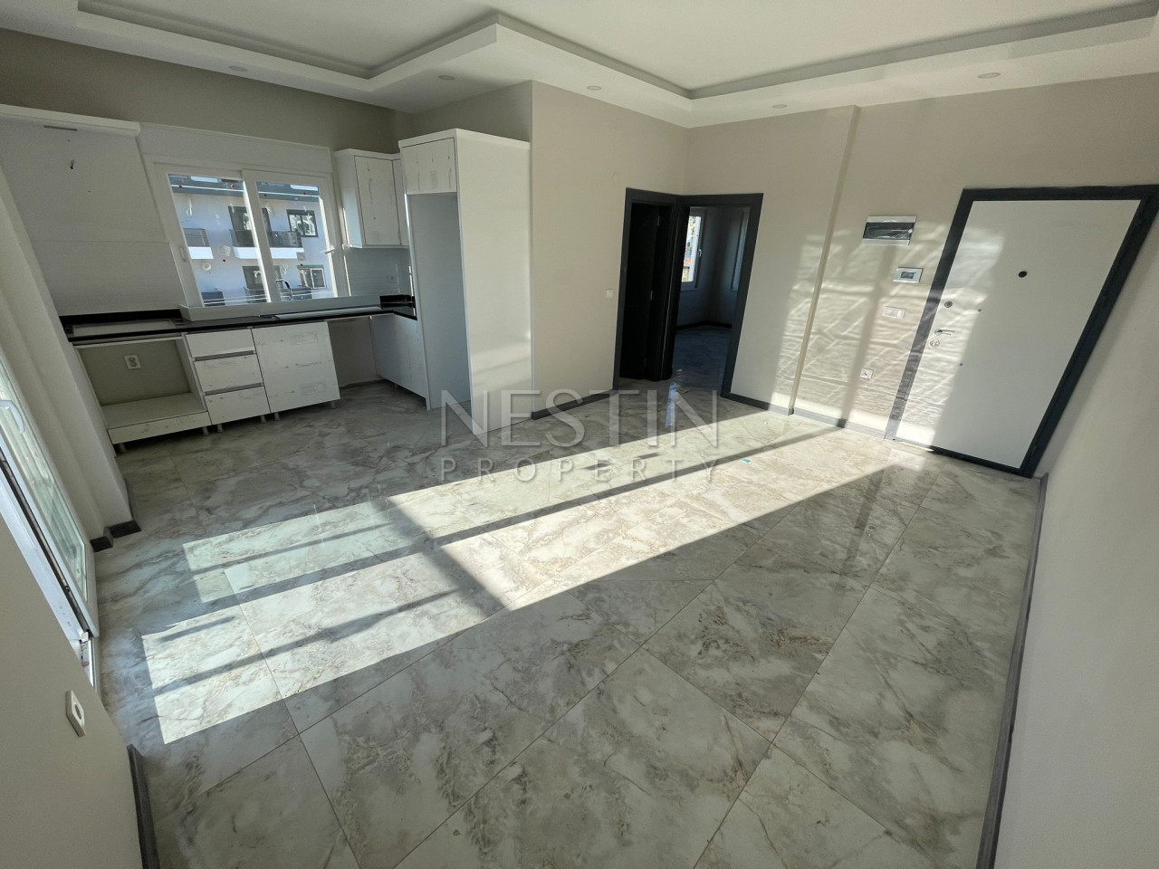 Квартира 1+1 в районе Авсаллар в новом жилом доме в 1500 м от Средиземного моря фото 3