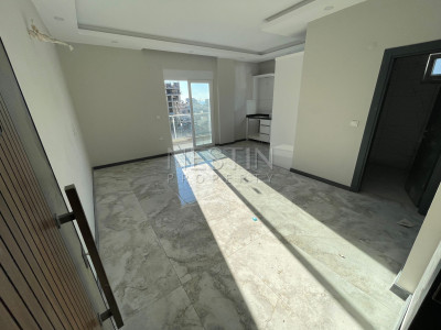 Квартира 1+1 в районе Авсаллар в новом жилом доме в 1500 м от Средиземного моря фото 4