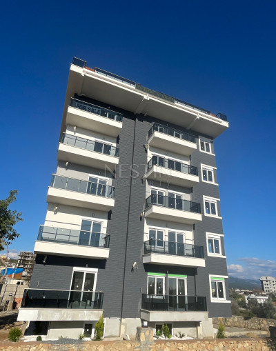 Квартира 1+1 в районе Авсаллар в новом жилом доме в 1500 м от Средиземного моря фото 10