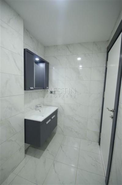 Прекрасный светлый пентхаус 2+1 в новой резиденции в центре Махмутлара фото 29