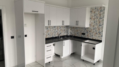 Квартира 1+1 в районе Оба, в новом жилом доме в 1200 м от Средиземного моря фото 2