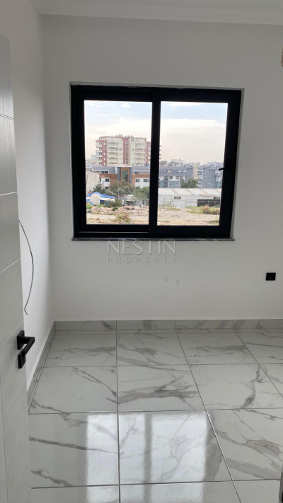 Квартира 1+1 в районе Оба, в новом жилом доме в 1200 м от Средиземного моря фото 5