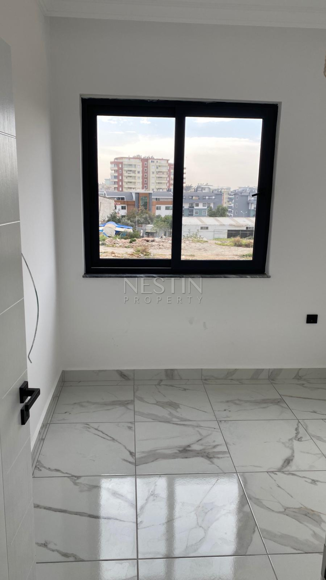 Квартира 1+1 в районе Оба, в новом жилом доме в 1200 м от Средиземного моря фото 5