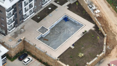 Квартира 1+1 в районе Оба, в новом жилом доме в 1200 м от Средиземного моря фото 11