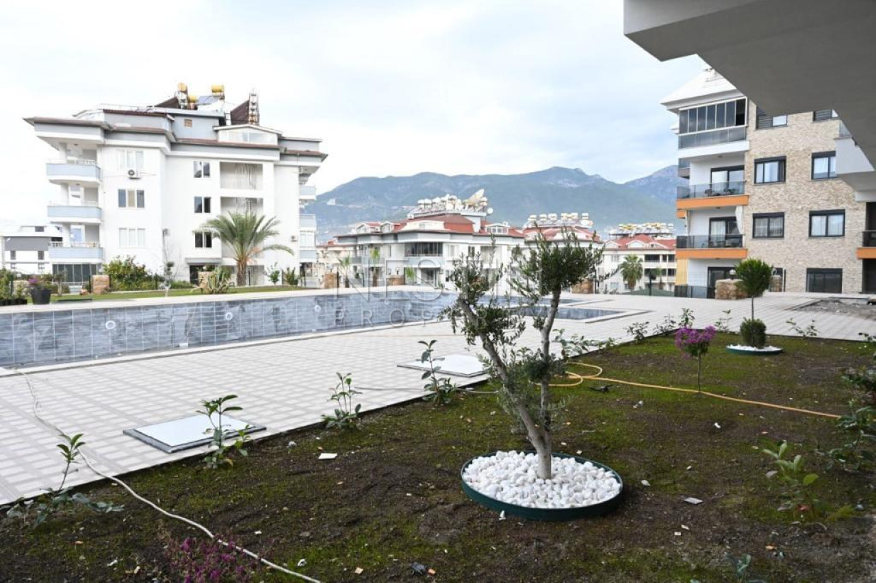 Квартира 1+1 в районе Оба, в новом жилом доме в 1200 м от Средиземного моря фото 19