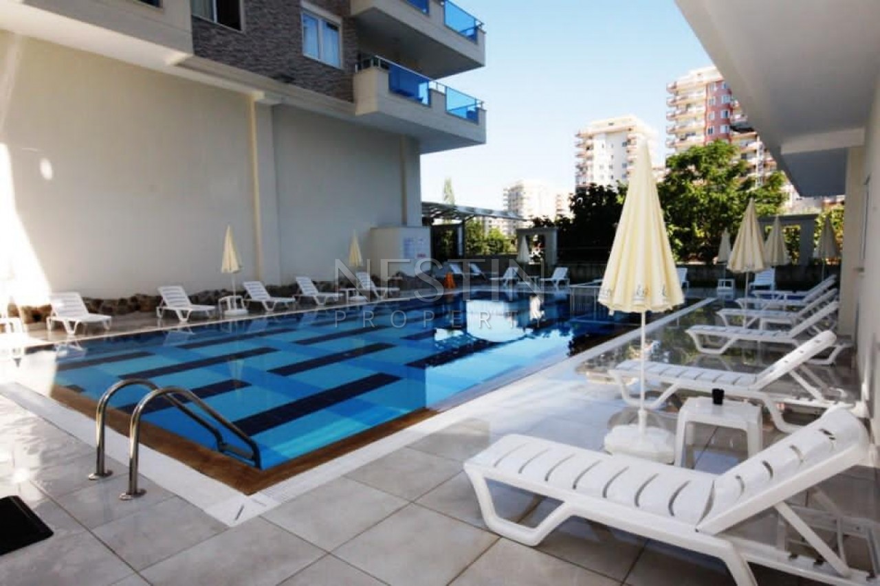 Квартира 1+1 с мебелью в новом доме от хорошего застройщика в Махмутларе фото 3