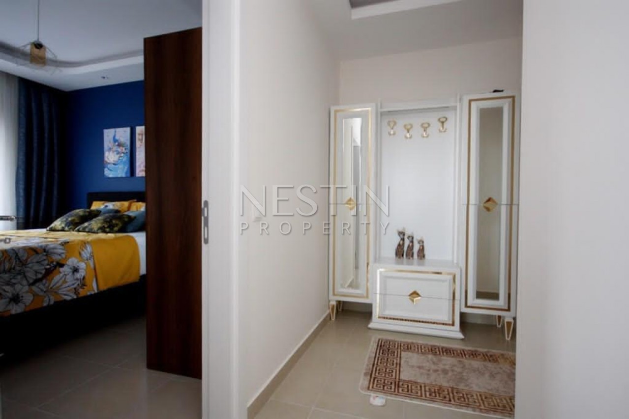 Квартира 1+1 с мебелью в новом доме от хорошего застройщика в Махмутларе фото 17