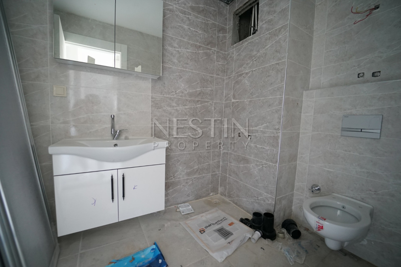 Квартира дуплекс 2+1 в районе Авсаллар в новом жилом доме фото 14